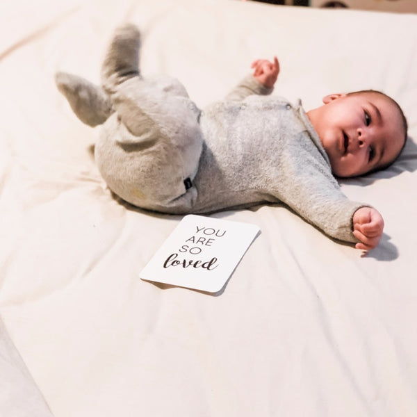 Milestone card you are so loved with cute baby showing how you would use the cards to keep record of milestones and great instagram pictures