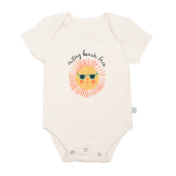 Finn + Emma Resting Beach Face onesie